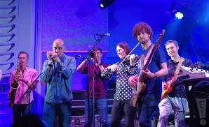 snarky puppy performing on stage at the miami beach bandshell in miami beach florida