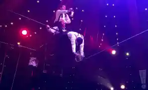 three men perform circus acrobatics in at absinthe in las vegas, nevada.