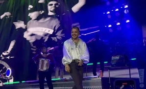 christian nodal performing on stage at the toyota arena in ontario california