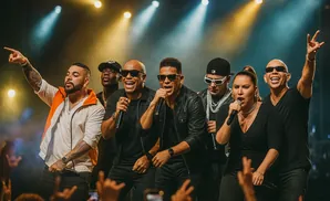 A group of singers performs on stage with bright lights and microphones.