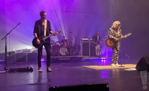 collective soul playing on stage in front of purple lights