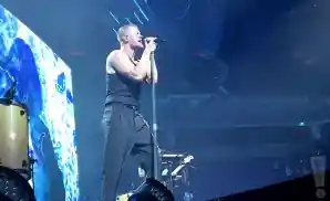 imagine dragons performing on stage at the colonial life arena in columbia, south carolina.