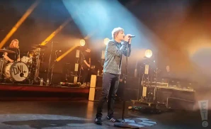 louis tomlinson performing on stage at the shepherd's bush empire in london england