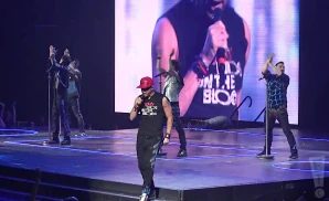 new kids on the block performing on stage shot of whole group
