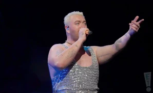 sam smith performing on stage for jingle ball 2022