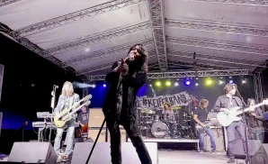 tom keifer of tom keifer band singing live on stage