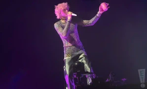 a live performance of machine gun kelly performing in north dakota