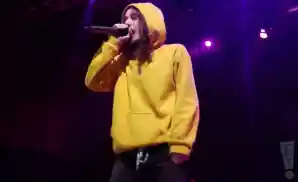pouya performing on stage at the house of blues in houston texas