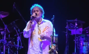 jon anderson performing on stage at the boulder theater in boulder colorado