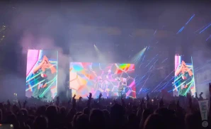 electronic dj martin garixx performs at night at a music festival