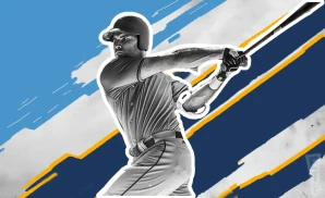 a myrtle beach pelicans baseball player midswing