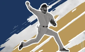 a kansas city royal baseball player pitching the ball