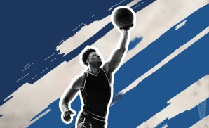 a minnesota timberwolves basketball player jumping to tip the ball to gain possession during a game