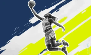 a dallas wings wnba basketball player jumping to dunk the ball in the basket
