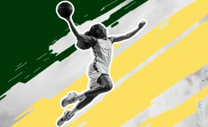 a seattle storm wnba basketball player jumping to dunk the ball in the basket