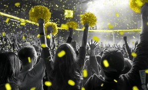 a crowd of appalachian state mountaineers fans cheering for their football team