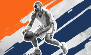 an auburn tigers basketball player looking down the court and dribbling the ball.