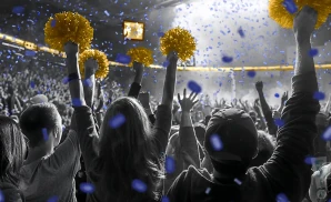 a crowd of concordia-st. paul golden bears fans cheering for their football team