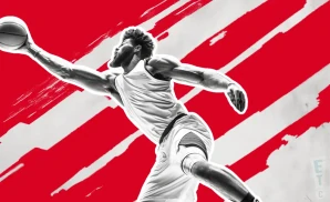 a georgia bulldogs basketball player reaching towards the ball in defense