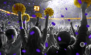 A crowd cheers with gold pom-poms and purple confetti.