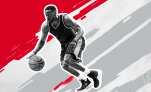 an ohio state buckeyes basketball player looking down the court and dribbling the ball