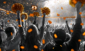 a crowd of oklahoma state cowboys fans cheering for their football team