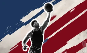 a st. marys gaels basketball player jumping to tip the ball to gain possession during a game