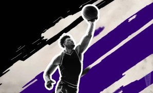 a tcu horned frogs basketball player jumping to tip the ball to gain possession during a game