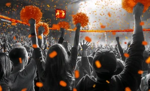 a crowd of tennessee volunteers fans cheering for their football team