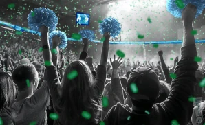 a crowd of tulane green wave fans cheering for their football team