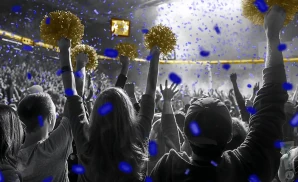 a crowd of tulsa golden hurricane fans cheering for their football team
