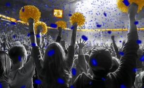a crowd of uc riverside highlanders fans cheering for their basketball team