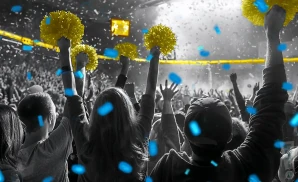 a crowd of ucla bruins fans cheering for their basketball team