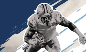 a toronto argonauts football player runs with the ball