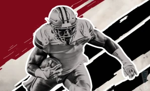 an atlanta falcons football player running with the ball