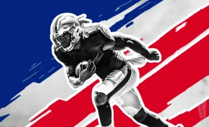 a buffalo bills football player runs with the ball