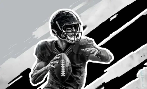 a las vegas raiders football player runs with the ball