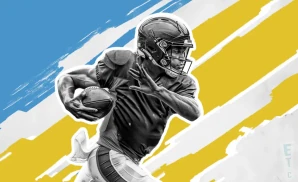 a los angeles chargers football player runs with the ball