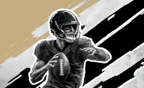 a new orleans saints football player runs with the ball