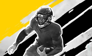 a pittsburgh steelers football player runs with the ball