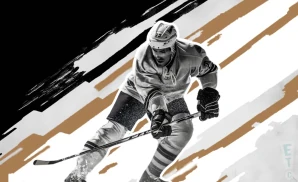 a blackfalds bulldogs ice hockey player about to hit the puck