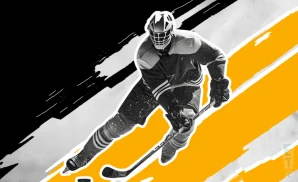 a brantford bulldogs ice hockey player about to hit the puck