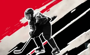 a chicago blackhawks hockey player about to hit the puck