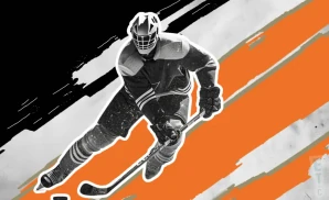 a fayetteville marksmen ice hockey player about to hit the puck