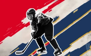 a florida panthers hockey player about to hit the puck