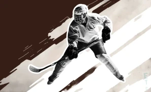 a kenai river brown bears ice hockey player about to hit the puck