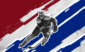 a montreal canadiens hockey player about to hit the puck