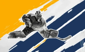  a nashville predators hockey player about to hit the puck