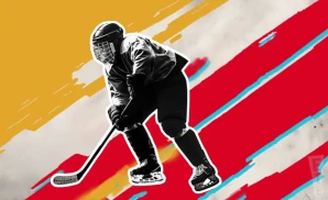 a new mexico ice wolves ice hockey player about to hit the puck