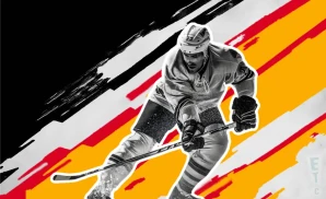 an wilkes-barre scranton penguins ice hockey player just about to hit the puck